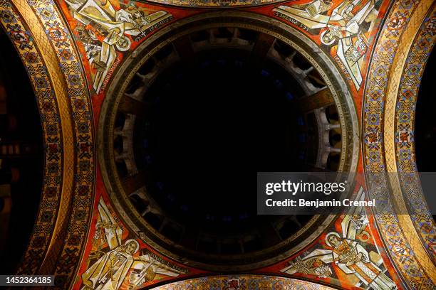 General view of interior dome details of the Basilica of Saint Therese of Lisieux on Christmas Day on December 25, 2022 in Lisieux, France. The...
