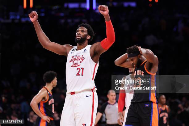 Joel Embiid of the Philadelphia 76ers reacts during the fourth quarter of the game against the New York Knicks at Madison Square Garden on December...