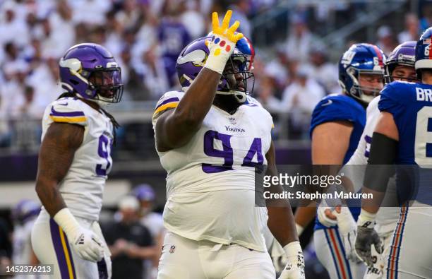 Dalvin Tomlinson of the Minnesota Vikings celebrates after a play in the first quarter of the game against the New York Giants at U.S. Bank Stadium...