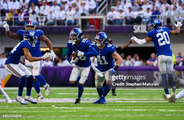 CorDale Flott of the New York Giants celebrates on a play in the third quarter of the game against the Minnesota Vikings at U.S. Bank Stadium on...