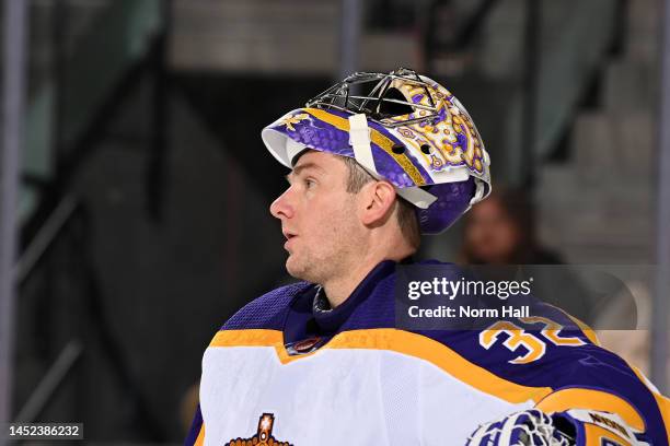 Jonathan Quick of the Los Angeles Kings looks up ice during a stop in play against the Arizona Coyotes at Mullett Arena on December 23, 2022 in...