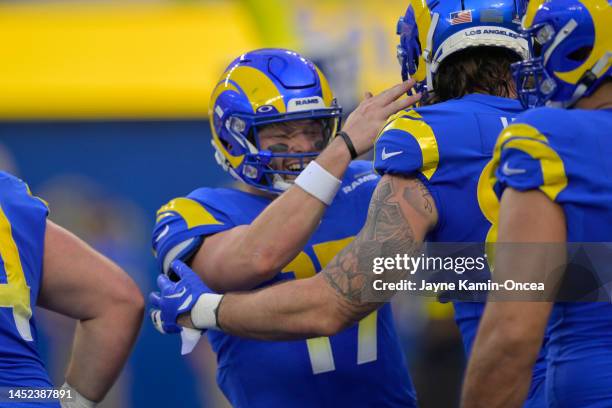 Baker Mayfield of the Los Angeles Rams celebrates after Tyler Higbee of the Los Angeles Rams scores a touchdown in the first quarter of the game...