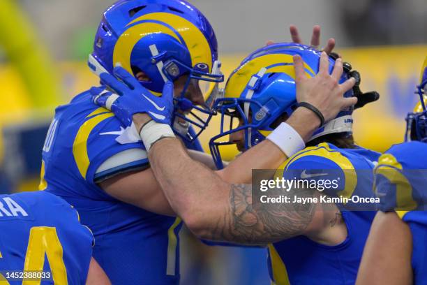 Baker Mayfield of the Los Angeles Rams celebrates with Tyler Higbee of the Los Angeles Rams after he scores a touchdown in the first quarter during...