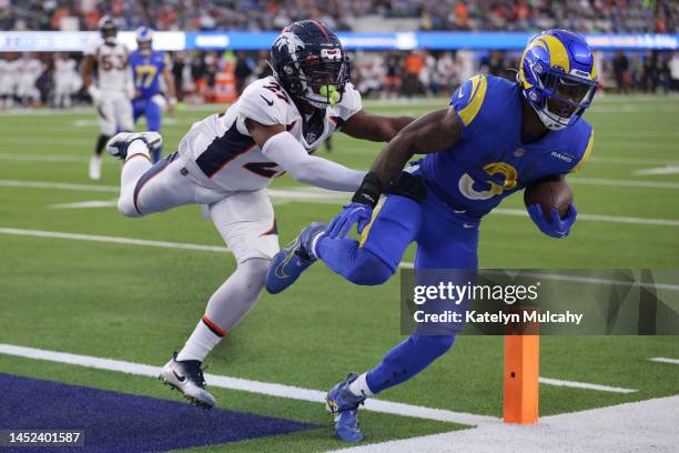 Cam Akers of the Los Angeles Rams scores a touchdown during the fourth quarter of the game against the Denver Broncos at SoFi Stadium on December 25,...