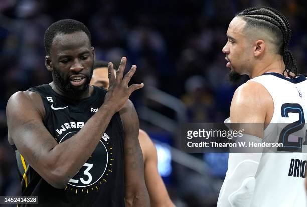Draymond Green of the Golden State Warriors and Dillon Brooks of the Memphis Grizzlies exchange word with each other during the second quarter at...