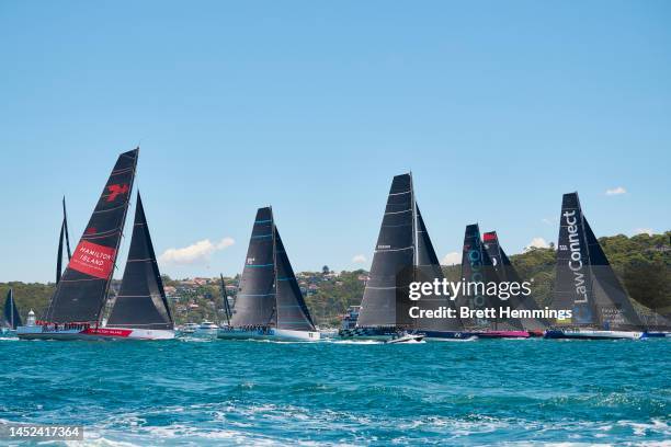 Yachts race through Sydney Harbour during the 2022 Sydney to Hobart on Sydney Harbour, on December 26, 2022 in Sydney, Australia.