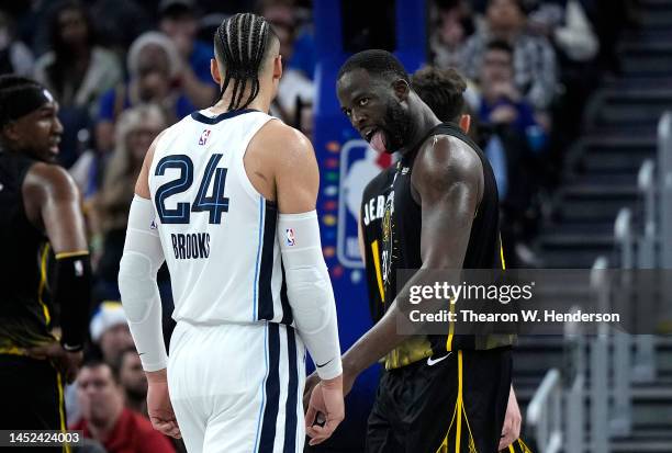 Draymond Green of the Golden State Warriors taunts Dillon Brooks of the Memphis Grizzlies during the fourth quarter at Chase Center on December 25,...