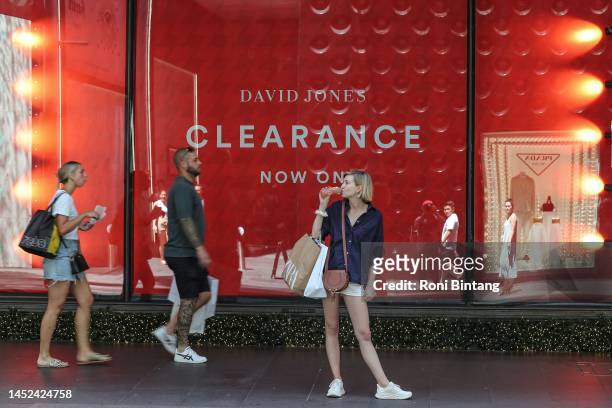 Shoppers are seen outside David Jones Department store during Boxing Day sales on December 26, 2022 in Sydney, Australia. Retailers offer massive...