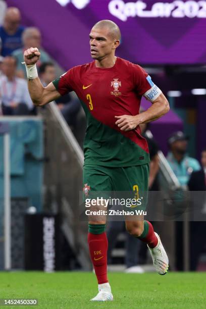 Pepe of Portugal celebrates his goal by head shots during the FIFA World Cup Qatar 2022 Round of 16 match between Portugal and Switzerland at Lusail...