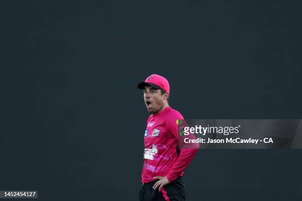 Moises Henriques of the Sixers reacts during the Men's Big Bash League match between the Sydney Sixers and the Melbourne Stars at Sydney Cricket...