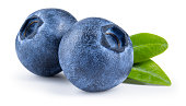 Blueberry isolated. Blueberry with leaves on white background. Two blueberries with clipping path. Full depth of field.