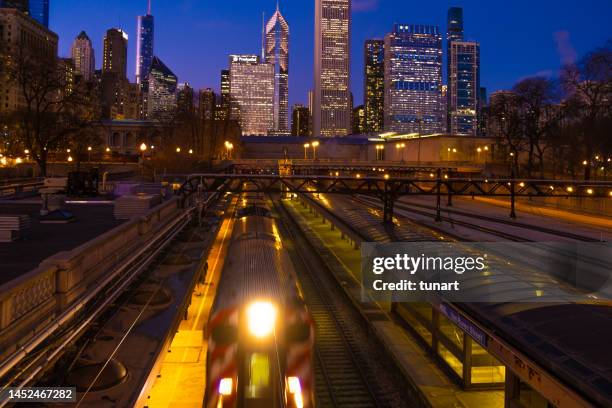 metra train station and chicago cityscape - bright chicago city lights stock pictures, royalty-free photos & images