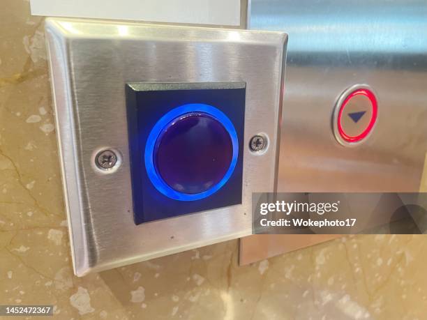 touchless elevator button - social distancing elevator stock pictures, royalty-free photos & images