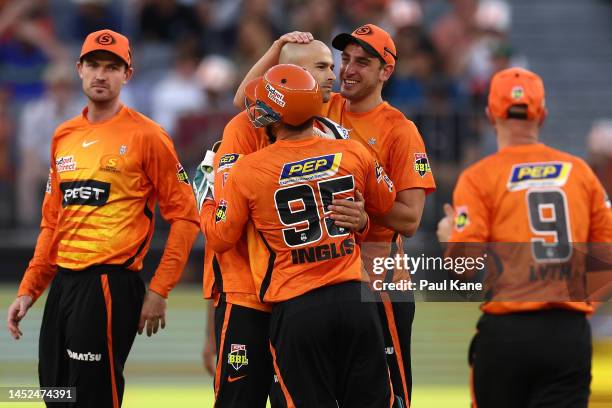 Ashton Agar of the Scorchers celebrates the wicket of Matthew Short of the Strikers during the Men's Big Bash League match between the Perth...