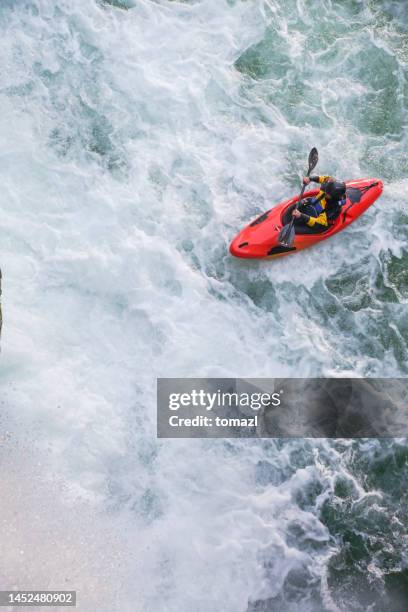 extreme whitewater kayaker - white water kayaking stock pictures, royalty-free photos & images