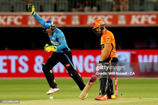 Faf du Plessis of the Scorchers is bowled out by Matt Short of the Strikers during the Men's Big Bash League match between the Perth Scorchers and...