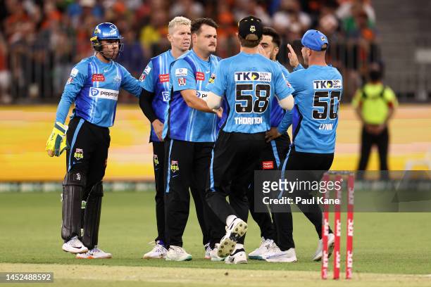 Ben Manenti of the Strikers celebrates the wicket of Josh Inglis of the Scorchers during the Men's Big Bash League match between the Perth Scorchers...