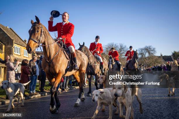 The horses and hounds of the North Cotswolds Hunt gather on the High Street of Broadway in Worcestershire on December 26, 2022 in Broadway, England....