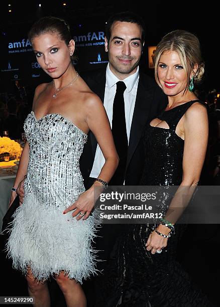 Alessandra Pozzi, Mohammed Al Turki and Hofit Golan attend the 2012 amfAR's Cinema Against AIDS during the 65th Annual Cannes Film Festival at Hotel...