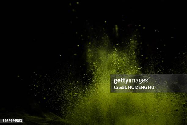 powdered matcha green tea - powder explosion stock pictures, royalty-free photos & images