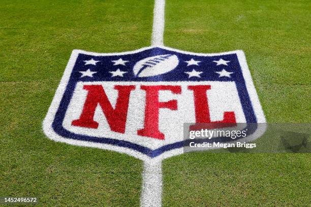 The NFL logo is seen on the field prior to a game between the Green Bay Packers and Miami Dolphins at Hard Rock Stadium on December 25, 2022 in Miami...
