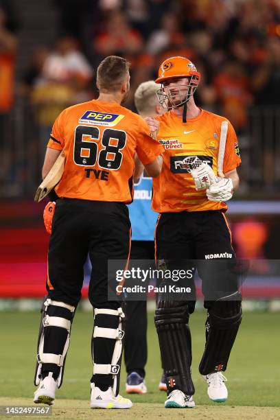 Andrew Tye and Ashton Turner of the Scorchers celebrate winning the Men's Big Bash League match between the Perth Scorchers and the Adelaide Strikers...