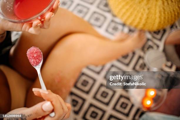 regular care is the key to beautiful and smooth legs - esfoliação imagens e fotografias de stock