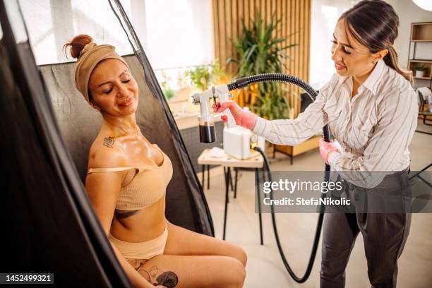 i will have a perfect complexion - sunbed stock pictures, royalty-free photos & images