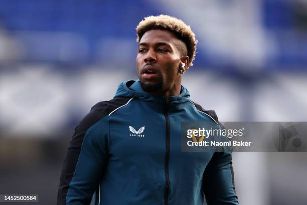 Adama Traore of Wolverhampton Wanderers inspects the pitch prior to the Premier League match between Everton FC and Wolverhampton Wanderers at...