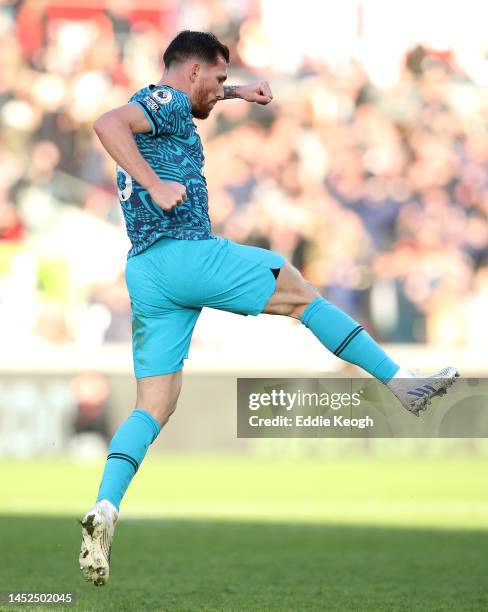 Pierre-Emile Hojbjerg of Tottenham Hotspur celebrates after scoring their side's second goal during the Premier League match between Brentford FC and...