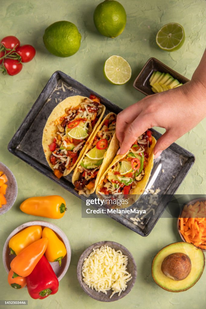Vegan Tacos Wraps Tex Mex food with beans, avocado, roast cauliflower and vegetables