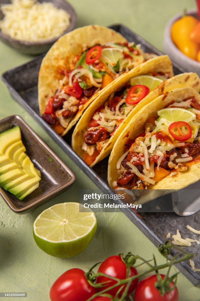 Vegan Tacos Wraps Tex Mex food with beans, avocado, roast cauliflower and vegetables