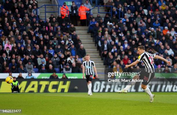 Chris Wood of Newcastle United scores the team's first goal from the penalty spot during the Premier League match between Leicester City and...