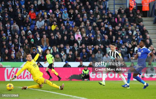 Miguel Almiron of Newcastle United scores the team's second goal past Danny Ward of Leicester City during the Premier League match between Leicester...