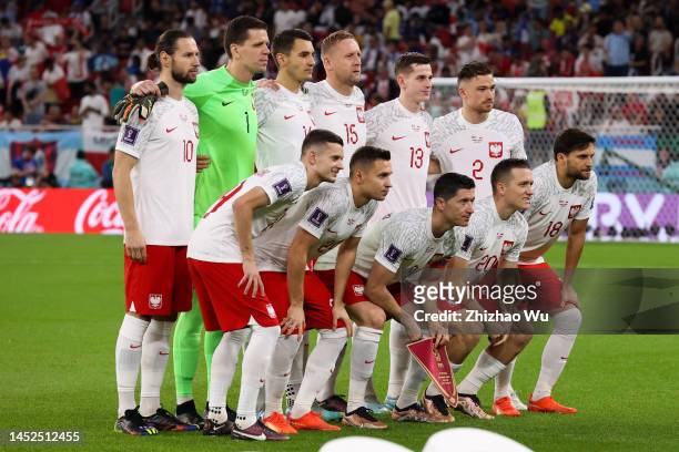 Players of Poland line up for team photo during the FIFA World Cup Qatar 2022 Round of 16 match between France and Poland at Al Thumama Stadium on...