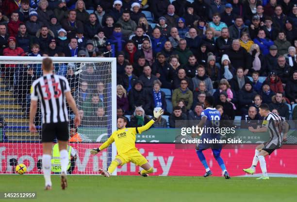 Miguel Almiron of Newcastle United scores the team's second goal past Danny Ward of Leicester City during the Premier League match between Leicester...