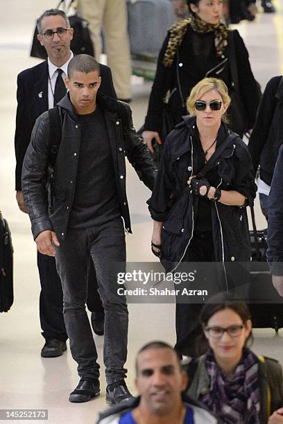 Brahim Zaibat and Madonna at JFK Airport on May 24, 2012 in New York City.