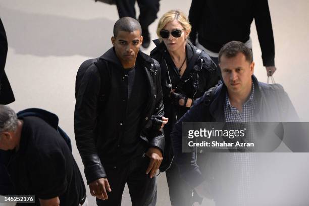 Brahim Zaibat and Madonna at JFK Airport on May 24, 2012 in New York City.