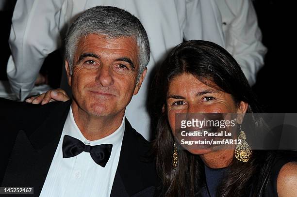 Antonio Belloni, Group Managing Director and Director LVMH, and wife attend the 2012 amfAR's Cinema Against AIDS during the 65th Annual Cannes Film...