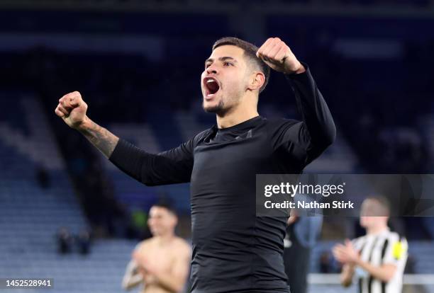 Bruno Guimaraes of Newcastle United celebrates following their side's victory in the Premier League match between Leicester City and Newcastle United...