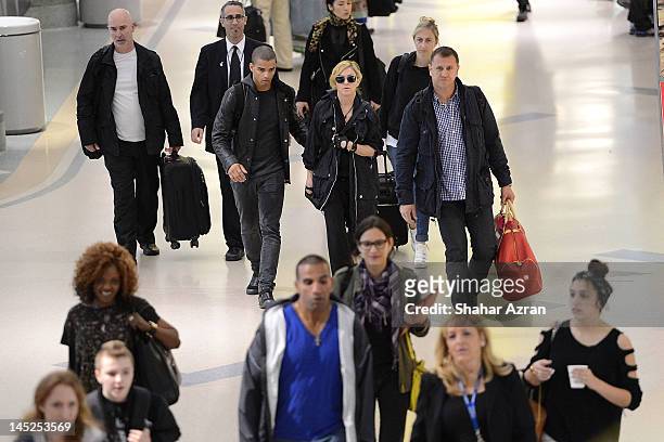 Brahim Zaibat and Madonna at JFK Airport on May 24, 2012 in New York City.