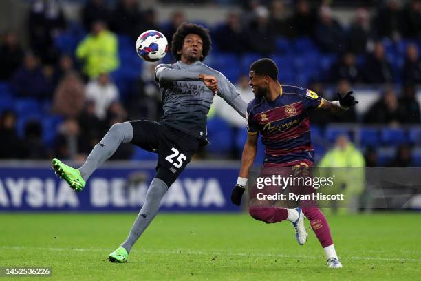 Jaden Philogene-Bidace of Cardiff City attempts to control the ball whilst under pressure from Kenneth Paal of Queens Park Rangers during the Sky Bet...