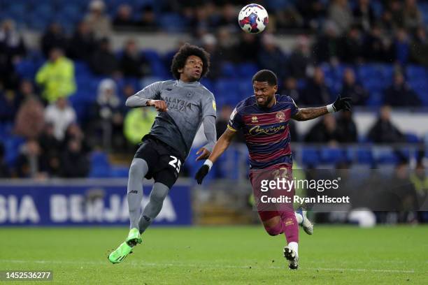 Jaden Philogene-Bidace of Cardiff City attempts to control the ball whilst under pressure from Kenneth Paal of Queens Park Rangers during the Sky Bet...