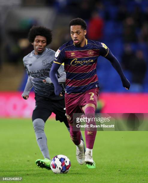 Chris Willock of Queens Park Rangers runs with the ball whilst under pressure from Jaden Philogene-Bidace of Cardiff City during the Sky Bet...