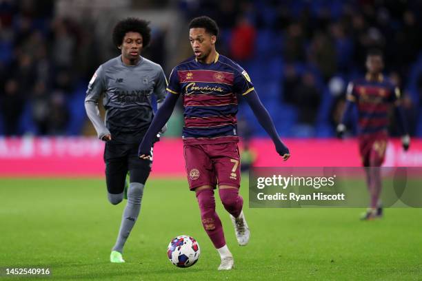 Chris Willock of Queens Park Rangers runs with the ball whilst under pressure from Jaden Philogene-Bidace of Cardiff City during the Sky Bet...