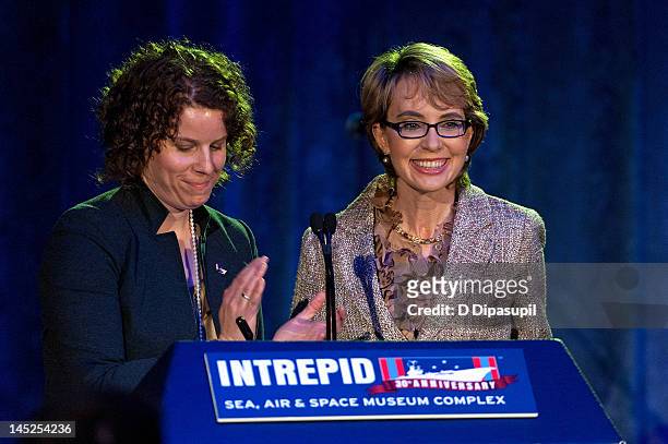 Chief of Staff Pia Carusone looks on as Congresswoman Gabrielle Giffords receives the 2012 Salute to Women award at the Intrepid Sea, Air & Space...