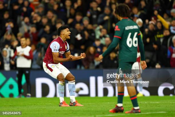 Ollie Watkins of Aston Villa celebrates after scoring their side's first goal during the Premier League match between Aston Villa and Liverpool FC at...