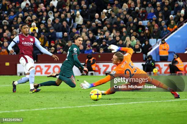 Darwin Nunez of Liverpool shoots wide past Robin Olsen of Aston Villa during the Premier League match between Aston Villa and Liverpool FC at Villa...