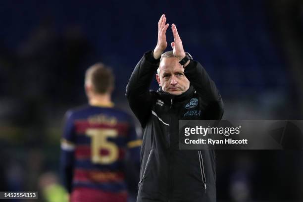 Neil Critchley, Manager of Queens Park Rangers, applauds their fans after the Sky Bet Championship between Cardiff City and Queens Park Rangers at...