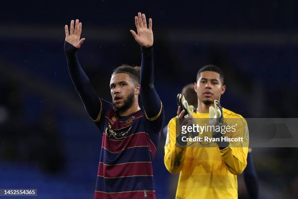 Tyler Roberts of Queens Park Rangers acknowledges their fans after the Sky Bet Championship between Cardiff City and Queens Park Rangers at Cardiff...